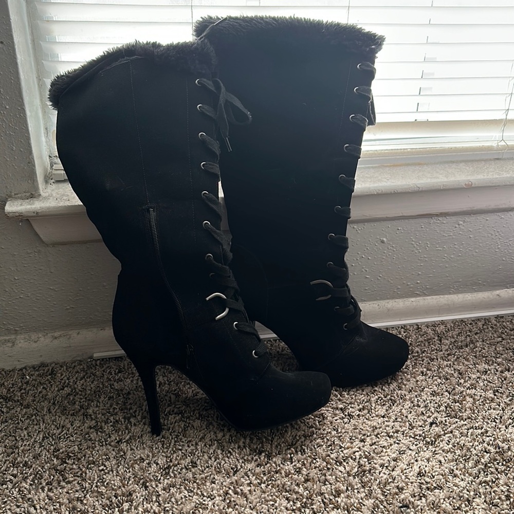 Andiamo high heel boots with fur .
